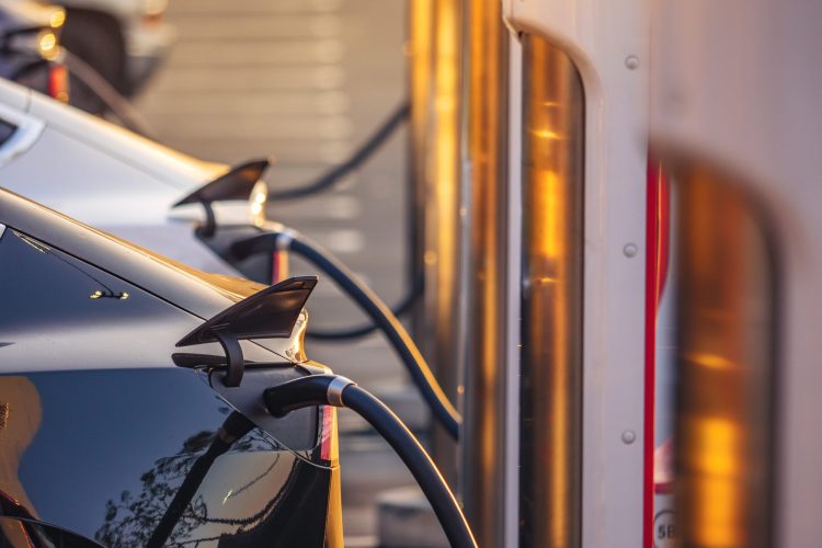 Tesla-Charging-scaled-1.jpeg Tesla-Charging-scaled-1.jpeg